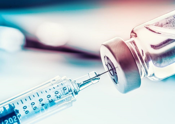 syringe and bottle mrna vaccine